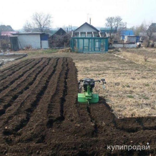 Вспашка земли в Зиме